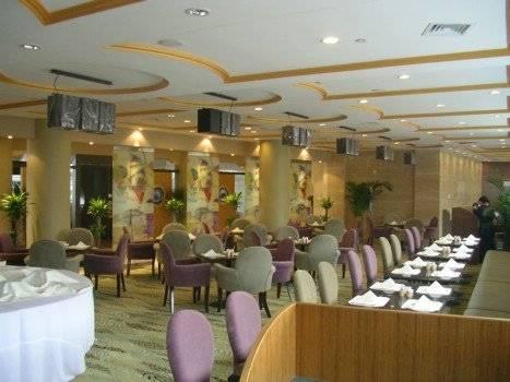 تشينغداو Sophia International Hotel المطعم الصورة